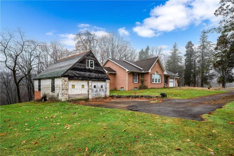 The detached garage was from the original home on the property.  It needs some tlc but could provide great storage/garage space.