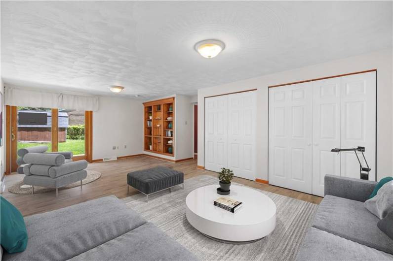 The family room has plenty of storage to help keep the home well organized.