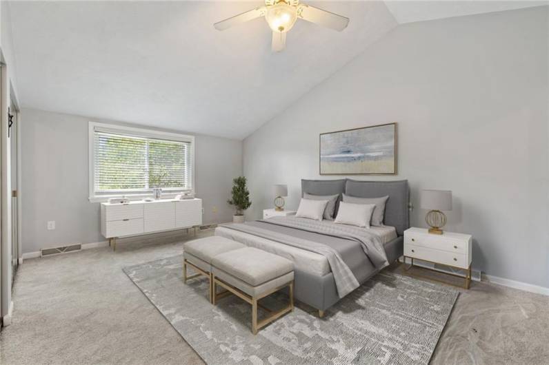 The primary bedroom is your private oasis.