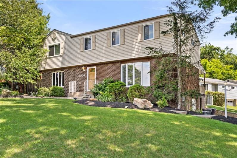 Situated on a corner lot, this Baldwin Beauty is loaded with curb appeal.