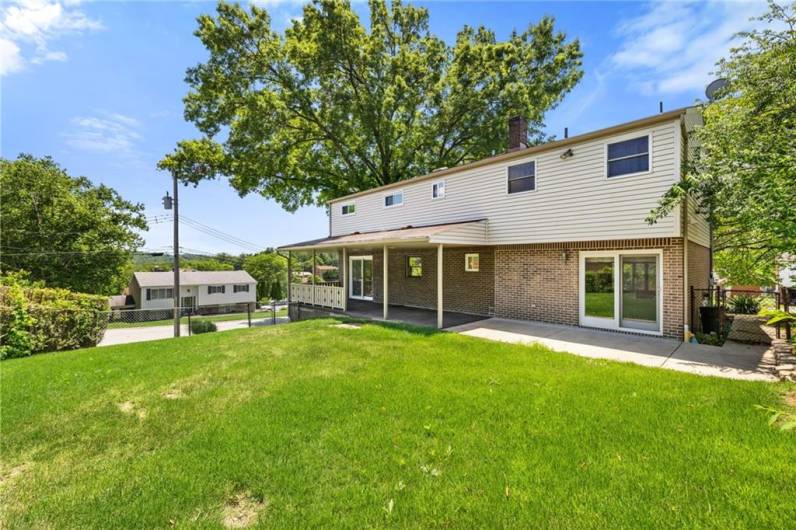 Level, fenced-in backyard.