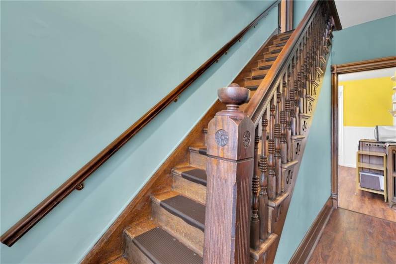 Staircase with original intricate spindles and posts!