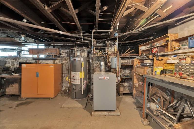 Brand new cast iron boiler heating system and newer hot water tank!