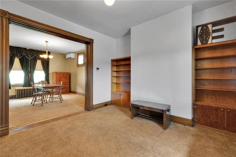 Check out the spacious living room area of this house.