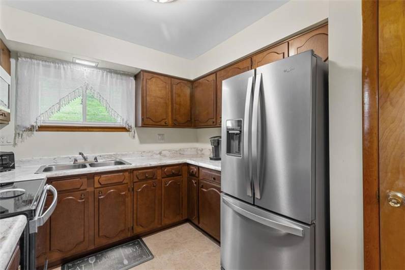 Upstairs kitchen with stainless steel appliances