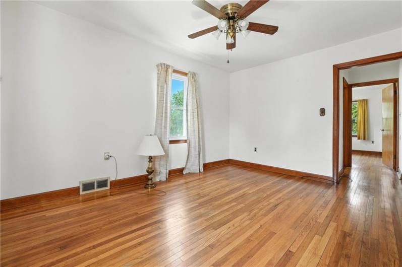 2nd bedroom,11x13,  with original hardwood floors and laundry is in the closet.  Laundry can be moved to basement.