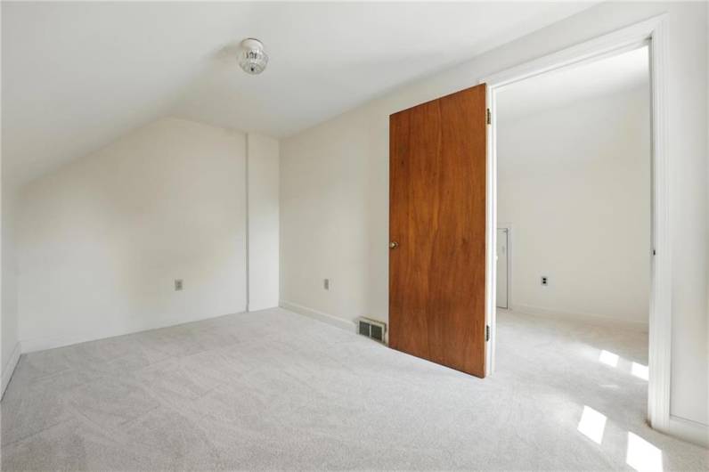 bedroom 3, 8x13,  with new carpet, hardwoods are under the carpet