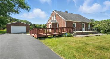 Charming cape code on 1 acre of land.  This well maintained home has a new septic in 2015, one car detached garage, and  handicapped access outside.. 3/4 bedrooms, original hardwood floors on first floor, eat in kitchen with newer appliances included.  The upper level has 1/2 bath, and 2 bedrooms with new carpet.  This home offers a blend of rural with quick access to 18 and shopping.