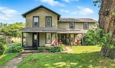 A complete view of this delightful home and its generous grounds.