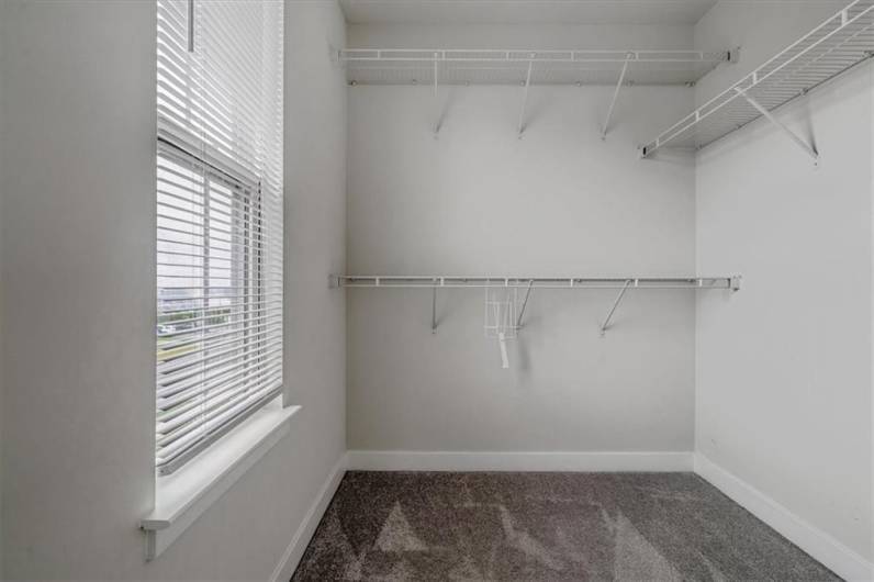 Large walk in closet in the primary bedroom