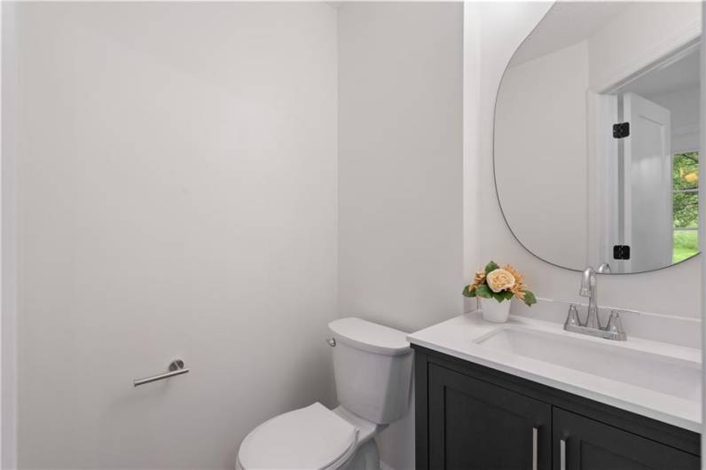 Powder Room off of the entry.