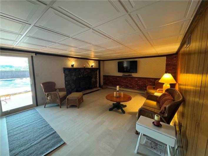 Family room lower level walk out to pool