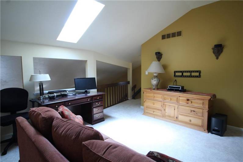 OVERLOOKING THE GREAT ROOM BELOW