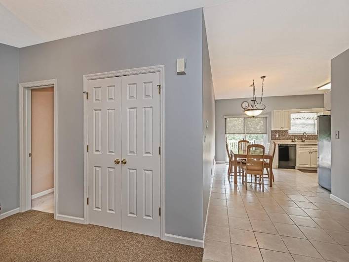 This spacious coat closet is ideal.
