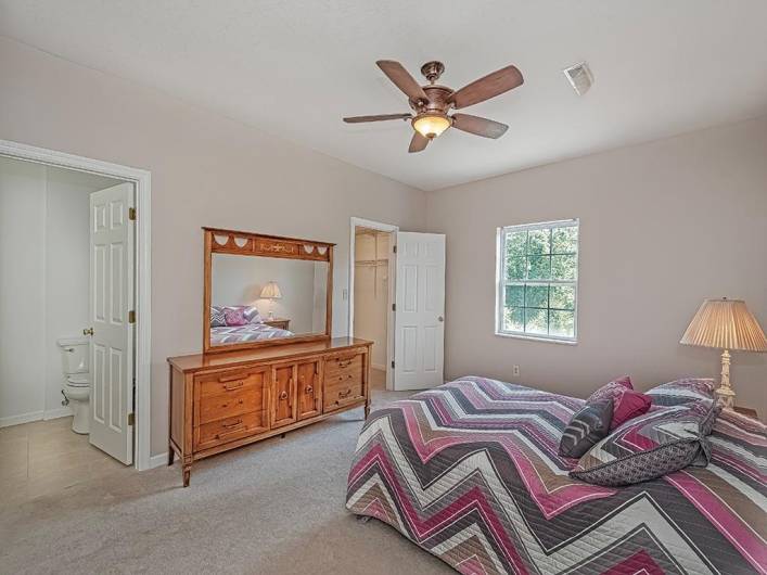 Spacious master with ensuite bath and walk-in closet.
