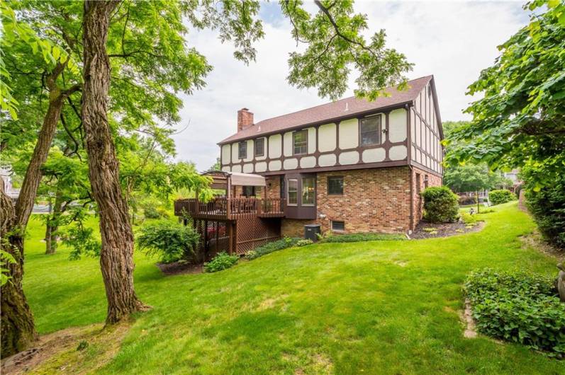 Rear view of 1193 Airedale! Gorgeous tudor style with charm and mature landscaping!