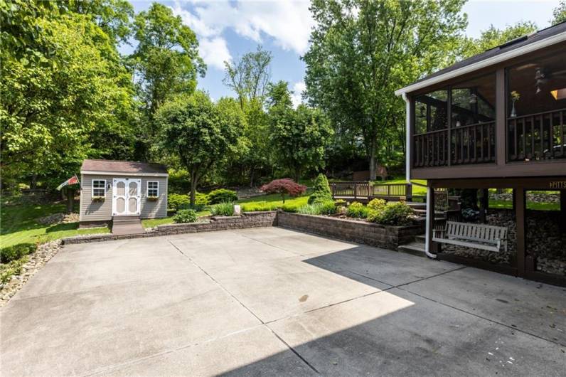 Adorable shed or playhouse, porch swing and a driveway large enough for 6-7 cars!