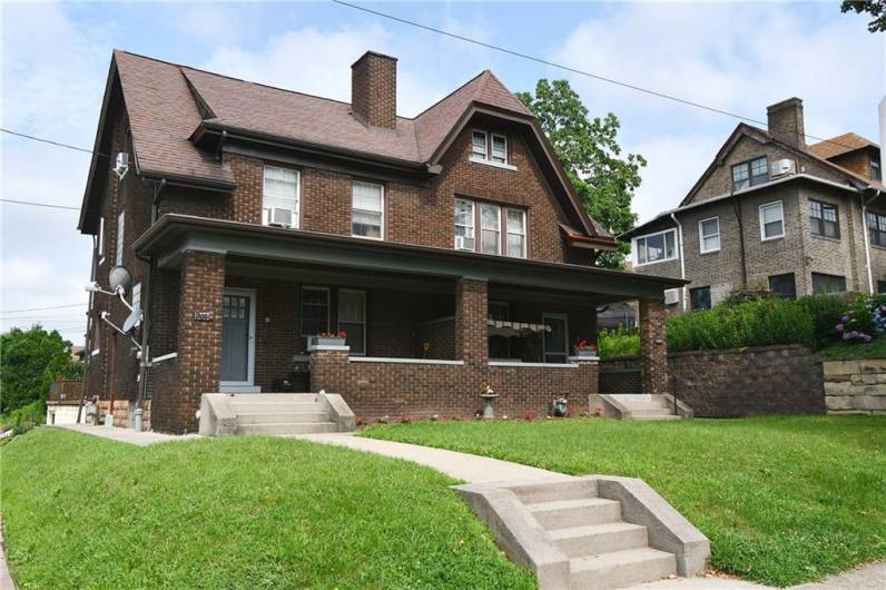 Corner Lot - Side by Side Brick Duplex with great curb appeal and facing Frick Park.  Newer Roof and Windows, and two front porches.