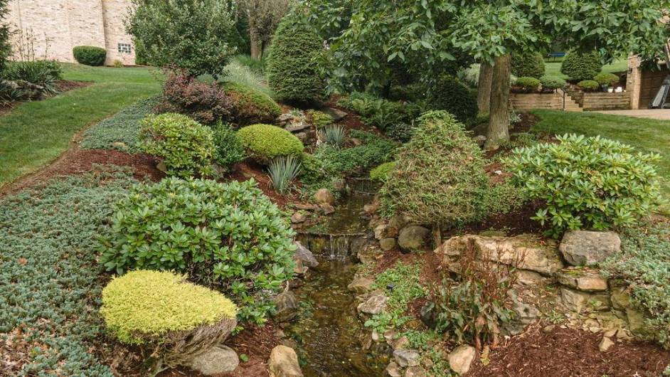 Water feature along side driveway