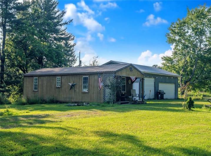 This cozy cabin sits on over one acre of serene land.