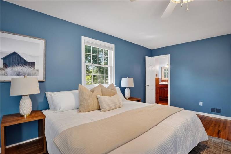 Natural light floods the space, creating a calming, airy retreat perfect for restful nights and tranquil mornings.