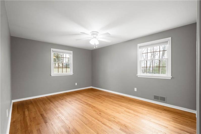 This bedroom is equally spacious, making it ideal for a guest room, home office, or additional family member—complete with room to spare and excellent storage options