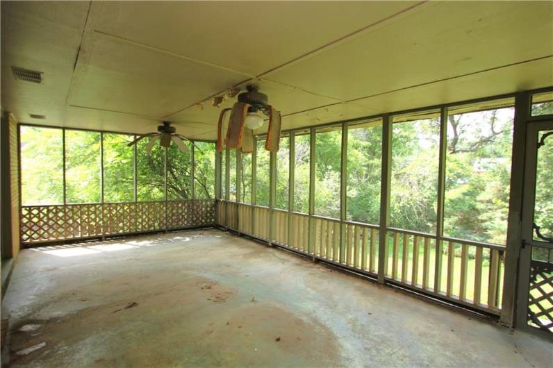 Another View of Spacious Screen-in Porch overlooking Mostly Private Back Yard