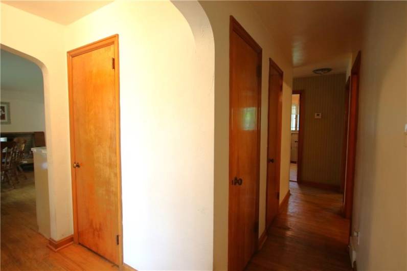 Convenient 6x5 Entry w/ Coat Closet & Attic Access. Hallway includes another Coat Closet plus Shelved Pantry