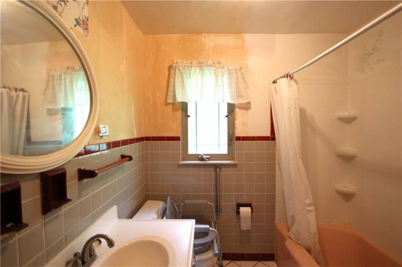 Full Bathroom on Main Level at end of Hallway