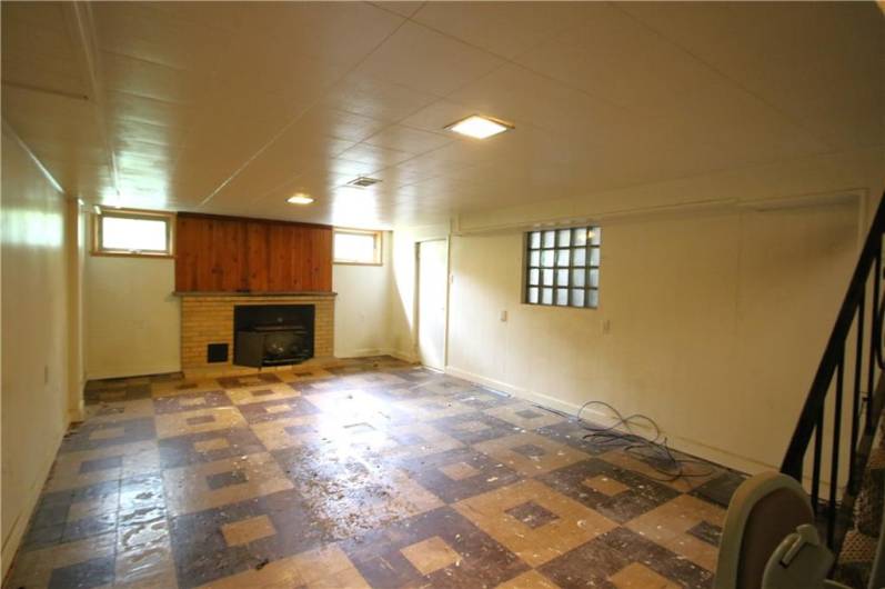 MASSIVE 26x13 Game Room w/ Wood Stove in Brick Fireplace