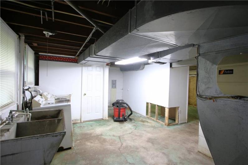 2 Separate Integral Garages, this one is 21x11 just off Game Room & Laundry