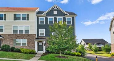 Welcome home to 1008 Adair! This fabulous end-unit townhome features a stone and Hardi-Plank exterior. This quaint community offers sidewalks, allowing you to easily walk to the gym, a restaurant, and more.