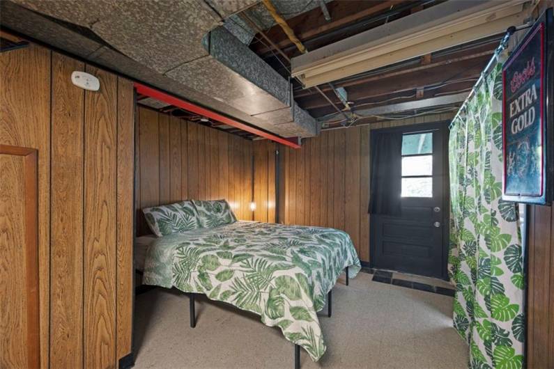 Basement Flex space, currently used as an extra guest bedroom.