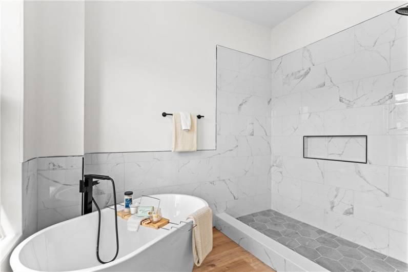 Walk-in shower and soak tub