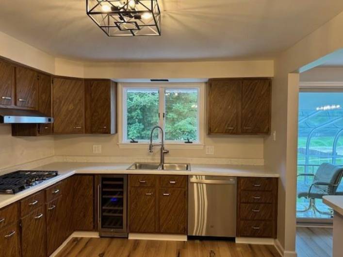 New stainless steel appliances and a wine chiller!