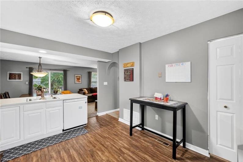 The laundry room is located behind the door on the right!