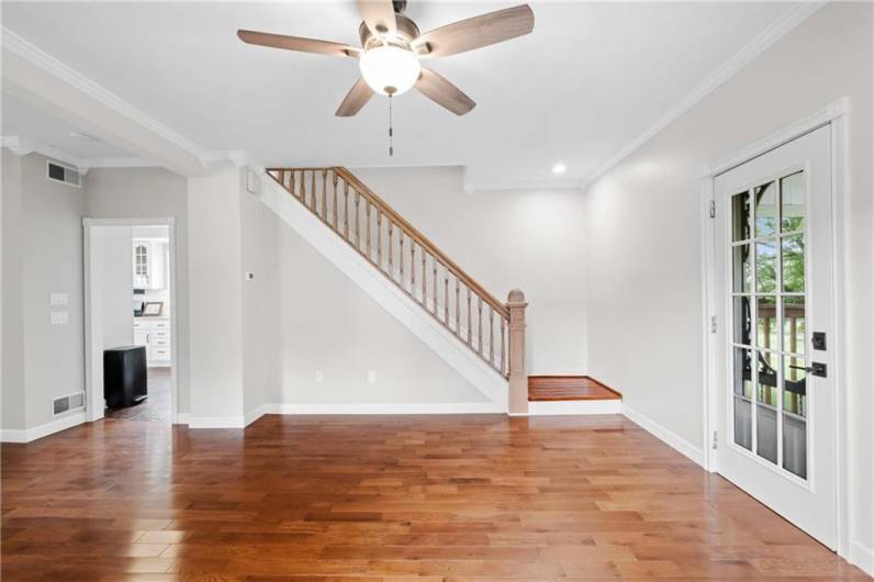Gleaming hardwood flooring in the living room