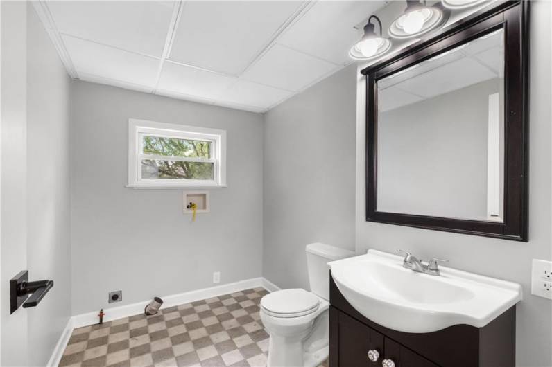 First floor updated powder room and laundry room~  Convenient!