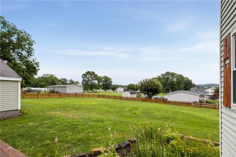 HUGE FENCED YARD AREA , the possibilities are endless... pets, gardens, pool, playsets!