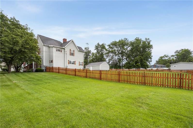 There is still quite a yard unfenced at front and side of the house~~  Road frontage if you wanted another entrance to the property