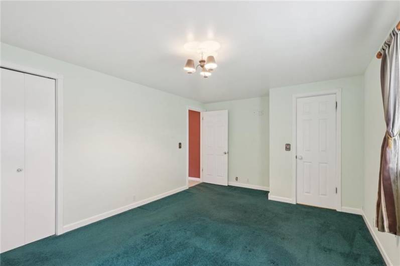 The walk-in closet also leads to a walk up attic