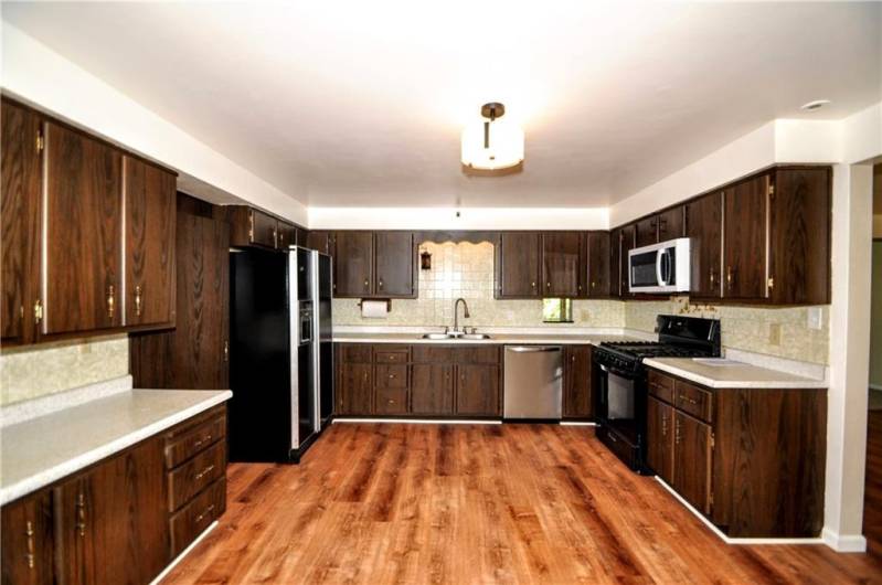 Abundance of Cabinetry in HUGE Eat-in Kitchen w/ Appliances Included