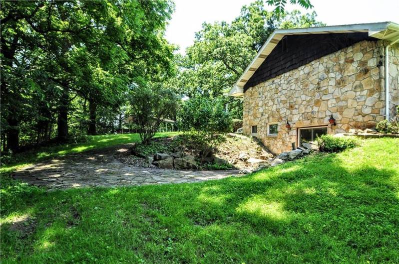 Side Yard leading to Sliding Glass Doors in Lower Level Kitchen area
