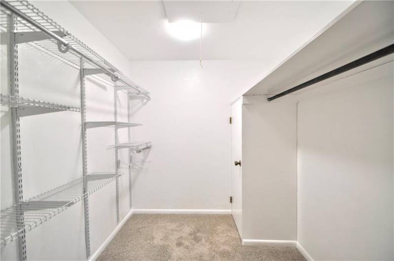 HUGE 7x4 Walk-in Closet w/ Organizers & Cedar Closet area plus convenient pull-down attic access