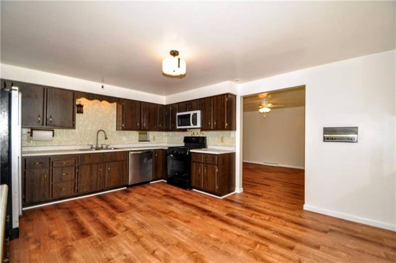 HUGE 16x13 Eat-in Kitchen w/ Newer Flooring & Freshly Painted