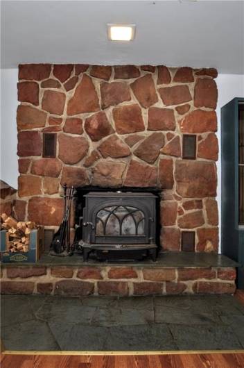 Stunning Stone Wood Burning Fireplace in Family Room