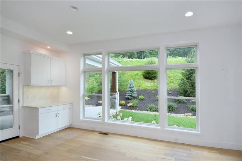 The dining area in the kitchen walks out to the covered patio!