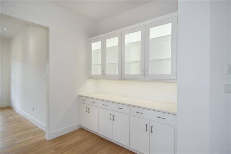 Butlers Pantry between kitchen and dining room.