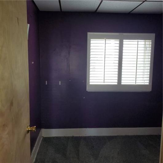 Third bedroom.  All bedrooms have overhead lighting and plantation shutters.