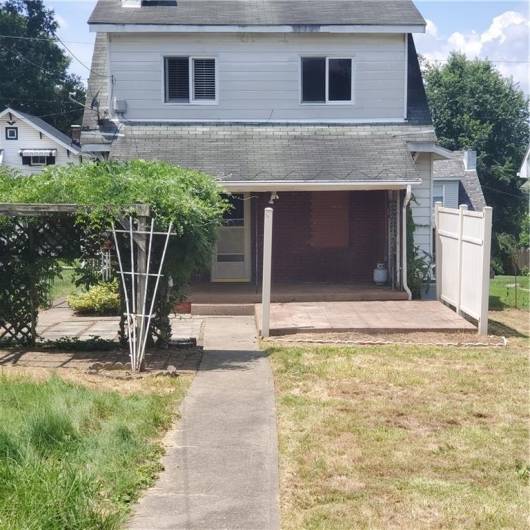 Nice covered patio as well as concrete area that is not covered.